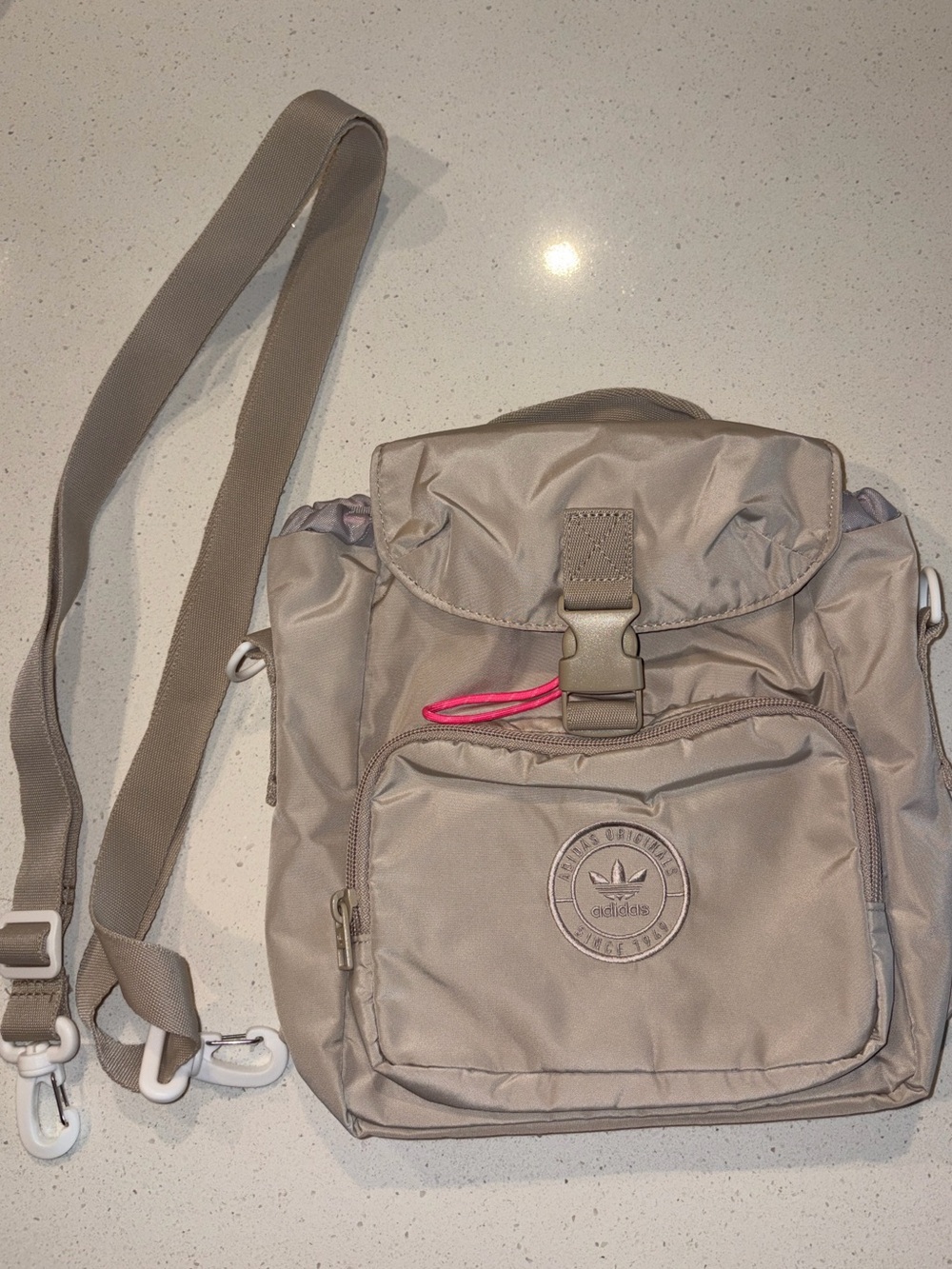 Adidas Taupe Crossbody Backpack with Pink Pull